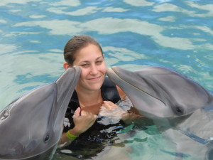 Getting some kisses at Dolphin Cove!